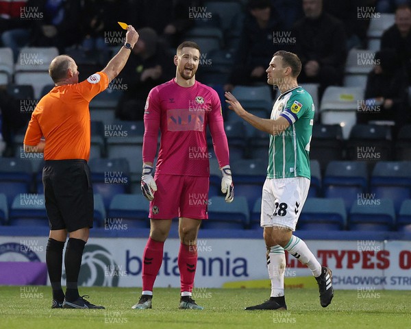 070123 - Rochdale v Newport County - Sky Bet League 2 - Goalkeeper Joe Day of Newport County is shown the yellow card in the 1st half by referee Andy Haines