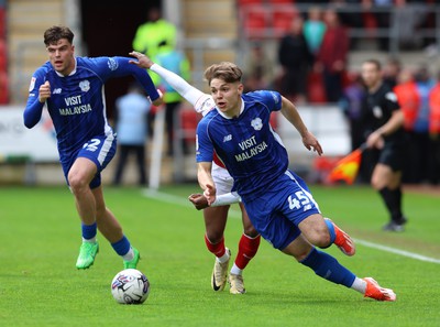 040524 - Rotherham United v Cardiff City - Sky Bet Championship - Cian Askford of Cardiff takes the ball from Sebastian Revan of Rotherham United