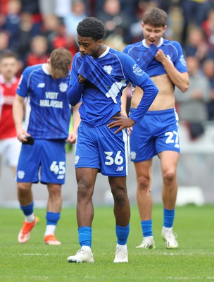 040524 - Rotherham United v Cardiff City - Sky Bet Championship - Cian Askford of Cardiff and Raheem Conte of Cardiff and Rubin Colwill of Cardiff look miserable at the end of the game losing 2-5