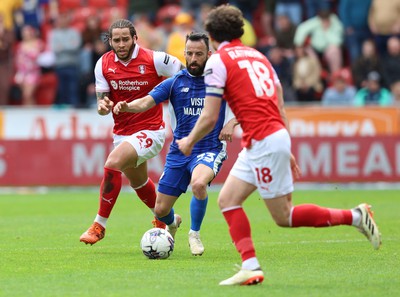 040524 - Rotherham United v Cardiff City - Sky Bet Championship - Manolis Siopis of Cardiff is caught by Sam Nombe of Rotherham United and Oliver Rathbone of Rotherham United