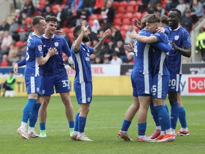 040524 - Rotherham United v Cardiff City - Sky Bet Championship - Ollie Tanner of Cardiff celebrates with David Turnbull and team mates after scoring 2nd goal