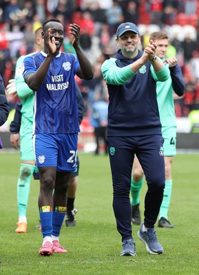 040524 - Rotherham United v Cardiff City - Sky Bet Championship - Manager Erol Bulut of Cardiff speaks to Famara Diedhiou of Cardiff at the end of the match with a laugh