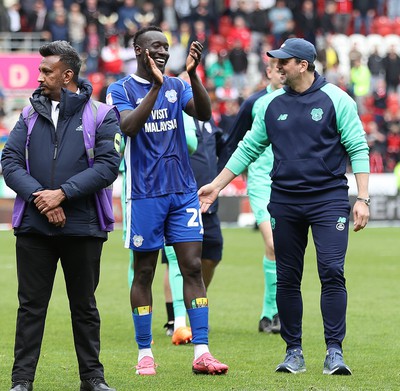 040524 - Rotherham United v Cardiff City - Sky Bet Championship - Manager Erol Bulut of Cardiff speaks to Famara Diedhiou of Cardiff at the end of the match with a laugh