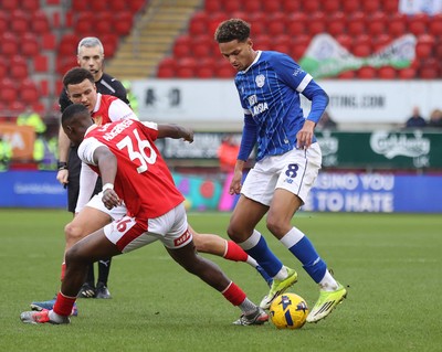 070226 - Rotherham United v Cardiff City - Sky Bet League 1 - Omari Kellyman of Cardiff tries to pass Emmanuel Adegboyega of Rotherham in the 1st half