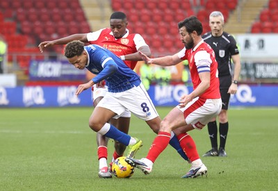 070226 - Rotherham United v Cardiff City - Sky Bet League 1 - Omari Kellyman of Cardiff tries to pass Emmanuel Adegboyega of Rotherham in the 1st half with Joe Rafferty of Rotherham