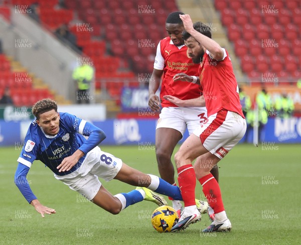 070226 - Rotherham United v Cardiff City - Sky Bet League 1 - Omari Kellyman of Cardiff tries to pass Emmanuel Adegboyega of Rotherham in the 1st half with Joe Rafferty of Rotherham