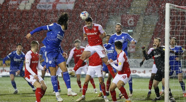 090221 - Rotherham United v Cardiff City - Sky Bet Championship - Marlon Pack of Cardiff has his shot on goal headed away by Clark Robertson of Rotherham United