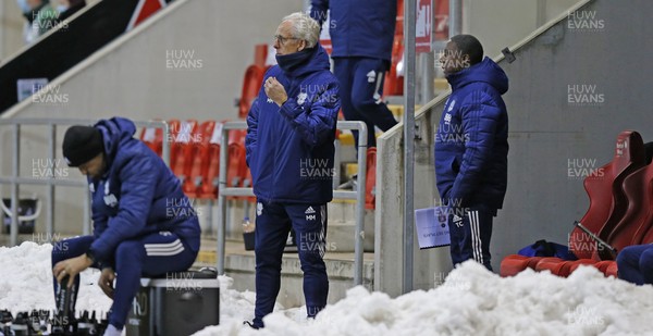 090221 - Rotherham United v Cardiff City - Sky Bet Championship - Manager Mick McCarthy of Cardiff gets a feel of the snowy conditions