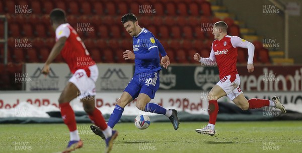 090221 - Rotherham United v Cardiff City - Sky Bet Championship - Kieffer Moore of Cardiff gets to the ball first followed by Ben Wiles of Rotherham United