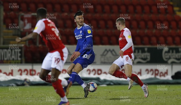 090221 - Rotherham United v Cardiff City - Sky Bet Championship - Kieffer Moore of Cardiff gets to the ball first followed by Ben Wiles of Rotherham United