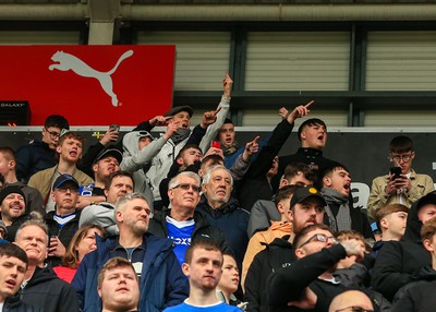 180323 - Rotherham United v Cardiff City - Sky Bet Championship - Cardiff fans chant at the Rotherham fans as they wait for a decision on the play after the game is stopped after a heavy downpour