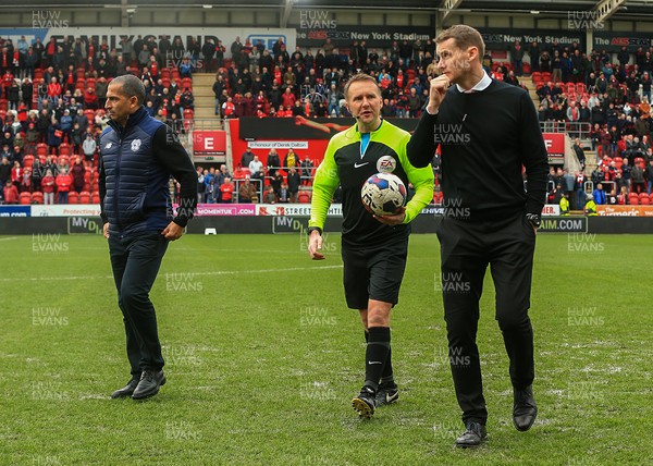 180323 - Rotherham United v Cardiff City - Sky Bet Championship - Cardiff Manager Sabri Lamouchi and Rotherham Manager Matt Taylor inspect the pitch with referee Oliver Langford after the game is stopped after a heavy downpour