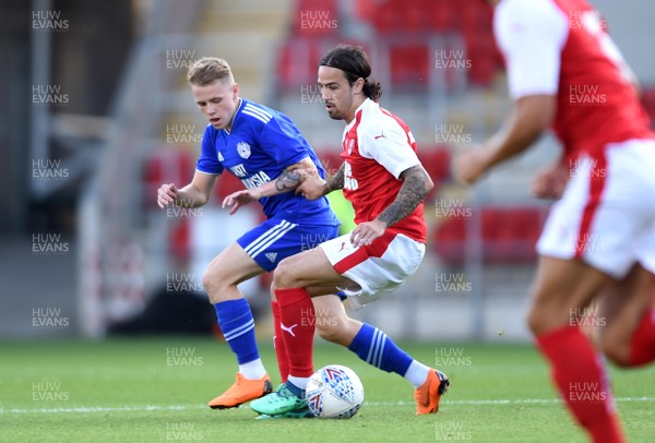 250718 - Rotherham United v Cardiff City - Preseason Friendly - James Waite of Cardiff City and Michael Smith of Rotherham compete