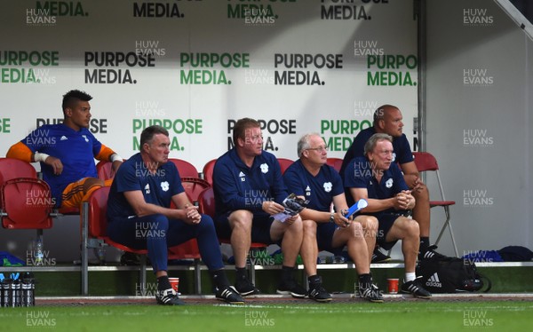 250718 - Rotherham United v Cardiff City - Preseason Friendly - Cardiff City manager Neil Warnock (right) looks on with his staff
