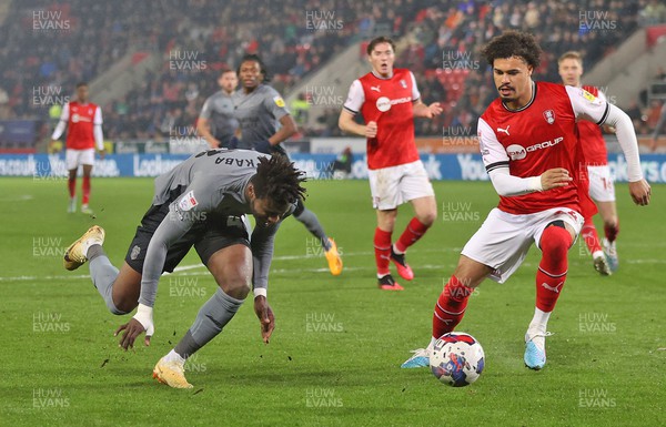 270423 - Rotherham v Cardiff - Sky Bet Championship - Sory Kaba of Cardiff receives the ball with Cameron Humphreys of Rotherham United and trips before he can take a shot on goal