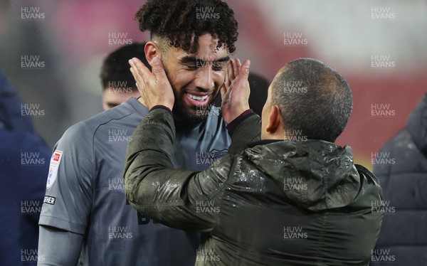 270423 - Rotherham v Cardiff - Sky Bet Championship - Manager Sabri Lamouchi of Cardiff hugs Kion Etete of Cardiff at the end of the match