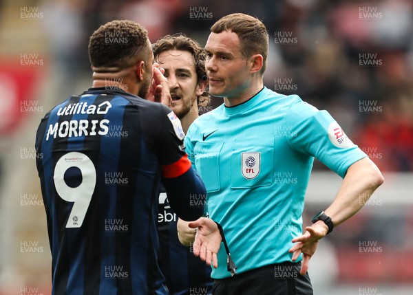 150423 - Rotherham United v Luton Town - Sky Bet Championship - Referee Leigh Doughty warns Carlton Morris of Luton Town to keep his head after a rough challenge