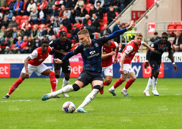 150423 - Rotherham United v Luton Town - Sky Bet Championship - Cauley Woodrow of Luton Town scores his sides second goal of the match from the penalty spot off a rebound save from Rotherham Goalkeeper Josh Vickers 