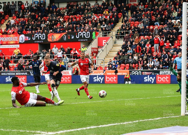 150423 - Rotherham United v Luton Town - Sky Bet Championship - Cauley Woodrow of Luton Town scores his sides second goal of the match from the penalty spot off a rebound save from Rotherham Goalkeeper Josh Vickers 