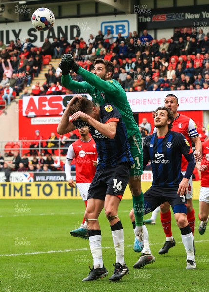 150423 - Rotherham United v Luton Town - Sky Bet Championship - Rotherham Goalkeeper Josh Vickers climbs above Reece Burke of Luton Town to punch clear