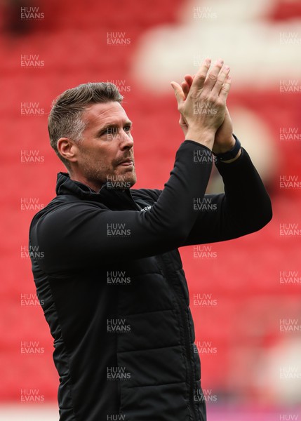 150423 - Rotherham United v Luton Town - Sky Bet Championship - Luton Town Manager Rob Edwards applauds Luton Town fans at full time