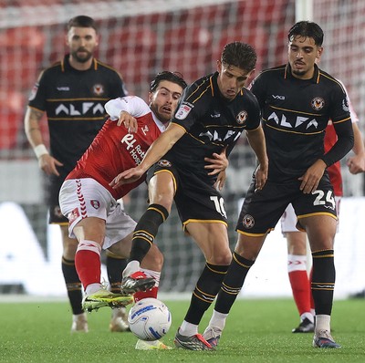 201026 - Rotherham United v Newport County - Sky Bet League 2 - Harrison Biggins of Newport juggles the ball with Kian Spence of Rotherham