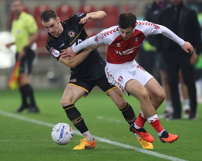 201026 - Rotherham United v Newport County - Sky Bet League 2 - Ciaran Brennan of Newport and Jayce Fitzgerald of Rotherham