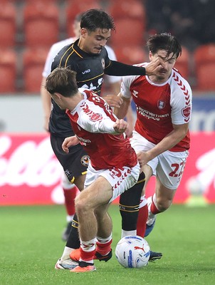 201026 - Rotherham United v Newport County - Sky Bet League 2 - Matt Dibley-Dias of Newport and Jayce Fitzgerald of Rotherham and Jamie Ellis of Rotherham