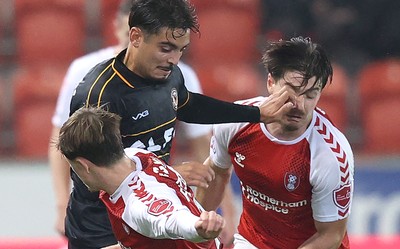 201026 - Rotherham United v Newport County - Sky Bet League 2 - Matt Dibley-Dias of Newport and Jayce Fitzgerald of Rotherham and Jamie Ellis of Rotherham