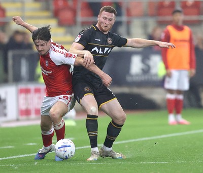 201026 - Rotherham United v Newport County - Sky Bet League 2 - Lee Jenkins of Newport and Jamie Ellis of Rotherham