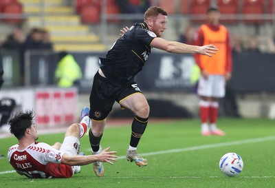 201026 - Rotherham United v Newport County - Sky Bet League 2 - Lee Jenkins of Newport and Jamie Ellis of Rotherham