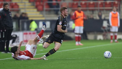 201026 - Rotherham United v Newport County - Sky Bet League 2 - Lee Jenkins of Newport and Jamie Ellis of Rotherham