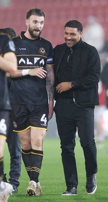 201026 - Rotherham United v Newport County - Sky Bet League 2 - Newport manager Hayden Mullins has a laugh with Kyle Cameron of Newport at the end of the match