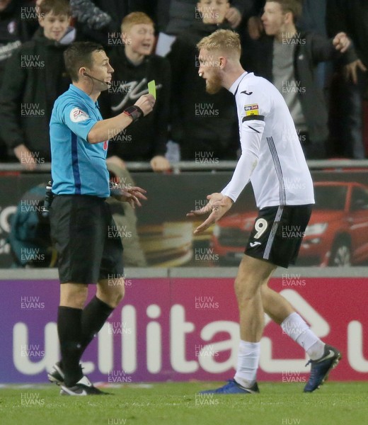 031118 - Rotherham United v Swansea City - Sky Bet Championship - 2nd penalty incident with Referee Tony Harrington being confronted by Oli McBurnie  of Swansea who receives a yellow card for his trouble