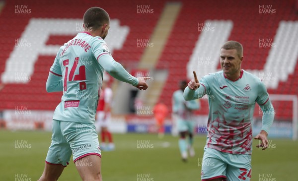 300121 - Rotherham United v Swansea City - Sky Bet Championship - Conor Hourihane of Swansea scores the 1st goal and celebrates with Jake Bidwell of Swansea