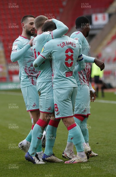 300121 - Rotherham United v Swansea City - Sky Bet Championship - Matt Grimes of Swansea powers in the 2nd goal and celebrates with team