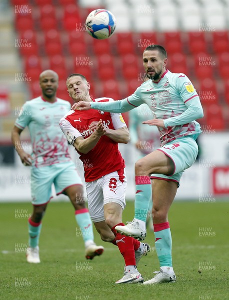 300121 - Rotherham United v Swansea City - Sky Bet Championship - Conor Hourihane of Swansea and Ben Wiles of Rotherham United