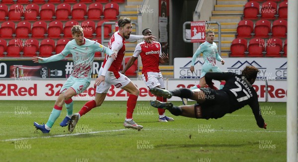 300121 - Rotherham United v Swansea City - Sky Bet Championship - Jay Fulton of Swansea back heels the 3rd goal out of reach of Jamal Blackman of Rotherham United