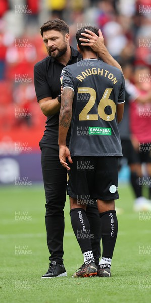 300722 - Rotherham United v Swansea City - Sky Bet Championship - Head Coach Russell Martin  of Swansea and Kyle Naughton of Swansea at the end of the match applaud the fans