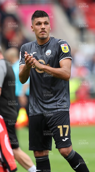 300722 - Rotherham United v Swansea City - Sky Bet Championship - Joel Piroe of Swansea at the end of the match applauds the fans