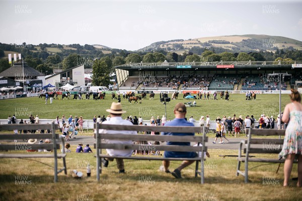 180722 - Picture shows action from the first day of the Royal Welsh Show, in Builth Wells The first time since 2019 the event has taken place The event has to contend with the extreme heatwave currently taking a grip of the country,