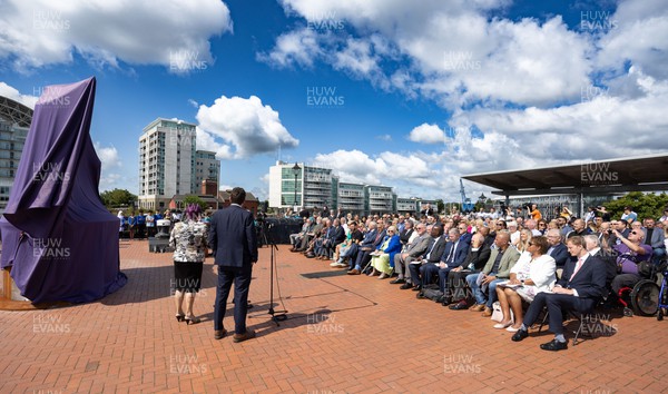 190723 - Cardiff Bay Rugby Codebreakers Statue Unveiling - Guests at the unveiling of a statue in Cardiff Bay to celebrate the achievements of rugby players from Cardiff Bay who joined rugby league teams