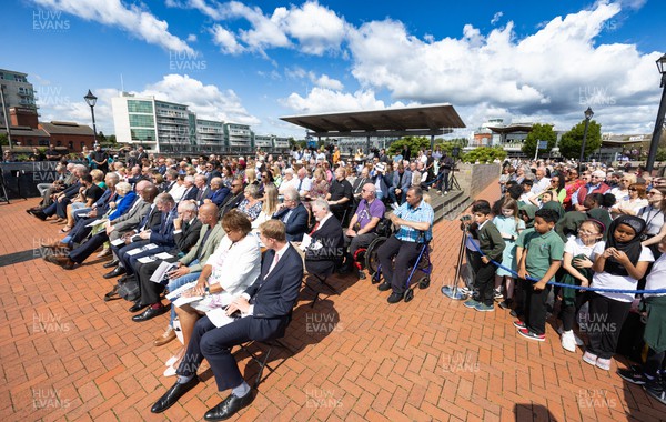 190723 - Cardiff Bay Rugby Codebreakers Statue Unveiling - Guests at the unveiling of a statue in Cardiff Bay to celebrate the achievements of rugby players from Cardiff Bay who joined rugby league teams