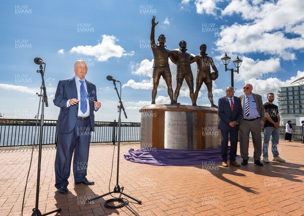 190723 - Cardiff Bay Rugby Codebreakers Statue Unveiling - Sir Stanley Thomas addresses guests during the unveiling of a statue in Cardiff Bay to celebrate the achievements of rugby players from Cardiff Bay who joined rugby league teams