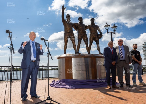 190723 - Cardiff Bay Rugby Codebreakers Statue Unveiling - Sir Stanley Thomas addresses guests during the unveiling of a statue in Cardiff Bay to celebrate the achievements of rugby players from Cardiff Bay who joined rugby league teams