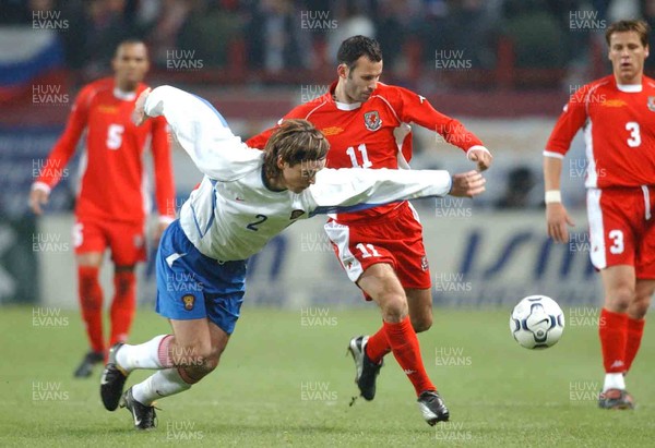 151103 - Russia v Wales - Ryan Giggs of Wales competes with Vadim Evseev