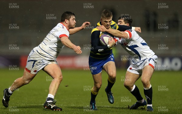091217 - Sale Sharks v Cardiff Blues - European Rugby Challenge Cup - Gareth Anscombe of Cardiff Blues is tackled by Marc Jones and Cameron Neild of Sale