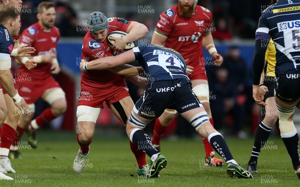 210117 - Sale Sharks v Scarlets - European Rugby Champions Cup - Jonathan Davies of Scarlets is tackled by George Nott of Sale Sharks by Chris Fairweather/Huw Evans Agency