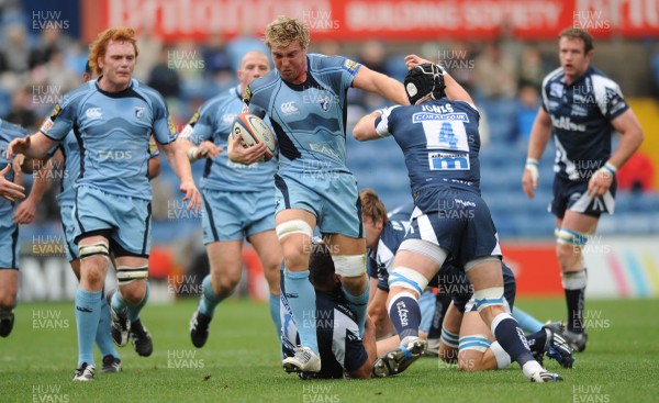 03.10.08 - Sale Sharks v Cardiff Blues - EDF Energy Cup - Cardiff's Andy Powell holds off Sale's Chris Jones. 