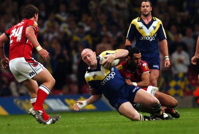 06.05.07 -Salford City Reds v Warrington Wolves Warrington's Rob Parker is brought down 